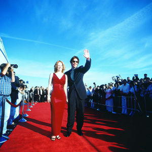 Gillian Anderson and Rodney Rowland at the MTV Movie Awards. Red carpet, surrounded by fans and paparazzi.