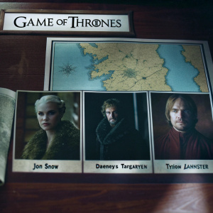 An extensive newspaper feature on Game of Thrones, showcasing detailed maps of Westeros and exclusive character photos.