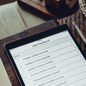 A screenshot showcasing a neatly organized table of Adobe Photoshop CC AppleScript commands and scripting references. The layout is clean and professional, clearly outlining parameters, objects, and returns.