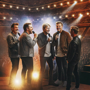Former Westlife members Mark Feehily, Shane Filan, Kian Egan, Nicky Byrne, and Brian McFadden reunite for a concert.