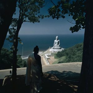 An awe-inspiring photograph of the colossal Lord Shiva statue towering over the serene coastal town of Murudeshwara in Uttara Kannada, Karnataka, India.