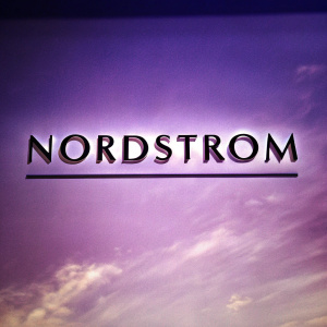 Nordstrom's bold, modern font against a sleek, white background. Promotional message highlights exclusive sale.