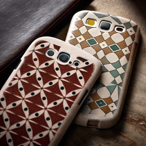 Custom back cover for Samsung Galaxy S3, featuring geometric pattern in earthy tones. Textured surface with cutouts for camera and buttons.