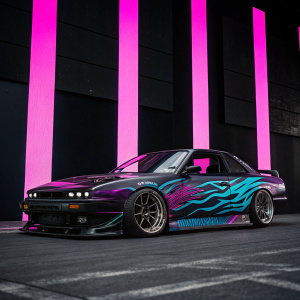 Custom Nissan Silvia S13 with striking flame graphics in shades of purple, blue, and dark gray. Displayed against a black backdrop with vertical pink stripes. Low profile and aggressive stance.