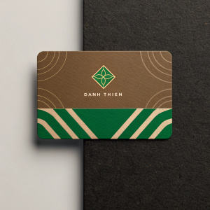Danh Thien's sleek business card. Green accents and brown base. Artistic logo and Vietnamese text. Modern design