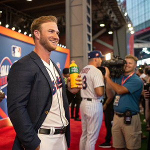 Pete Alonso at the MLB All-Star Game media day, holding a Gatorade bottle. Cheerful pose