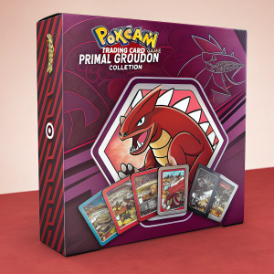 Promotional box for the Pokémon Trading Card Game: Primal Groudon Collection. Features a bold, purple and red color scheme. Central graphic showcases a dynamic, fiery design with Groudon. Illustrations of various Pokémon cards surround the central theme. Text reads 'Pokémon Trading Card Game'