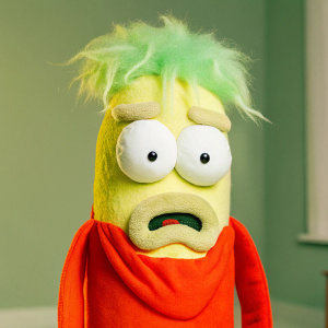 Mr Poopybutthole from Rick and Morty looking glum, with a sorrowful expression.