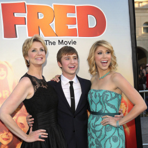 Jane Lynch, Lucas Cruikshank, and Jennette McCurdy at the premiere of 'Fred: The Movie'. The backdrop features the movie's poster and logos.