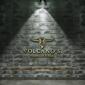 Volcano's Steakhouse & Ribs logo, a vibrant, stylized golden steak and ribs emblem against a dark blue backdrop.