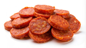 Create A High quality pepperoni pieces on white background