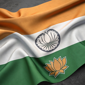 Digital 3D model of Indian flag. Wavy and wrinkled appearance. Saffron, white, and green stripes. Lotus emblem in muted tone.