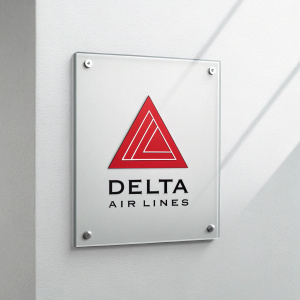 Delta Airlines logo featuring sleek, modern design. Red triangle with bold 'DELTA AIR LINES' inscription beneath it.