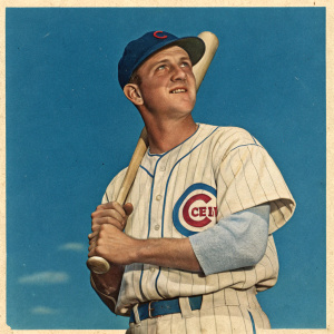 Vintage baseball card showcasing Brooks Kieschnick. Chicago Cubs player, Caucasian, holding bat, blue backdrop.