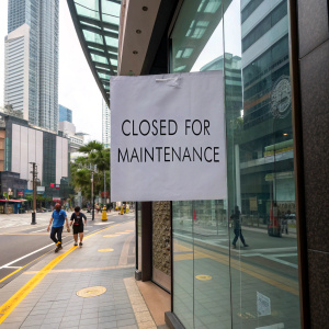 Temporary closure notice on a Sephora storefront in downtown Kuala Lumpur. The white paper with black text reads 'Closed for Maintenance.' Surrounding modern buildings and street scene visible.