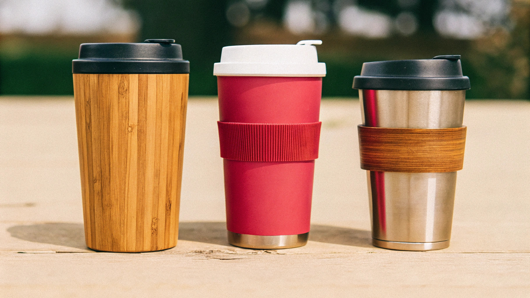 A comparison of bamboo, silicone, and stainless steel drinkware, highlighting their safety and eco-friendly attributes.