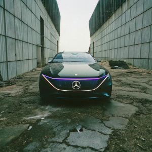 Conceptual rendering of Mercedes-EQ's Blitz Arrow. Hypersleek design, black car with accents of neon blue and purple lighting. Futuristic aesthetics, aerodynamic silhouette, modern branding. Set against a stark, black backdrop.