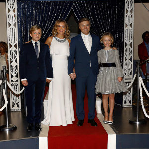 Ricky Schroder, Jennifer Nettles, Sam Haskell, and Alyvia Alyn Lind on a glamorous stage. Posed for SAG-AFTRA gala event. Lavish backdrop, audience visible