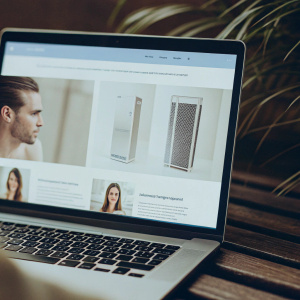 CryoNext's sleek new homepage. Features a minimalist design with blue and white hues. Prominent product images highlight the CryoCab Cryosauna, Revocryo Chamber, and CryoTherapy Video Training. Professional and contemporary look.