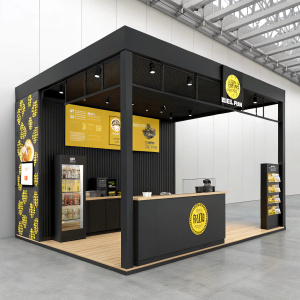 Neolith food roll concept showcased at Salone del Mobile Milano 2019. Modern black frame structure, highlighted with vibrant yellow branding elements.