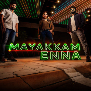 Promotional image for 'Mayakkam Enna'. Filmy industry figures against vibrant neon backdrop.