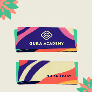 Gura Academy's sleek business cards, featuring a vibrant logo design with a blend of purple and earthy tones. The logo, a sophisticated geometric shape, is consistent across all cards.