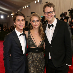 Nat Wolff and Cara Delevingne attend a glamorous awards ceremony. John Green joins them for a group photo.