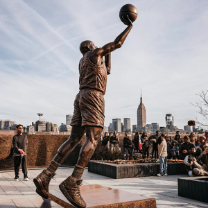 Shaquille O'Neal's statue unveiled at Madison Square Garden. New York City backdrop.