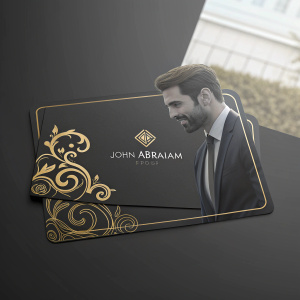John Abraham's sleek business card design. Elegant gold accents and dark background. Space reserved for logo