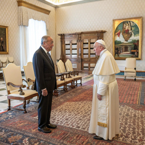 Francis, Pope, and Marcelo Rebelo de Sousa in formal meeting. Ornate rug and richly detailed furniture in the background. Apostolic Palace