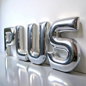 Bubble, puffy, shiny glossy silver 3D font, the word ((Plus)) is written on a white background, the text is placed frontally
