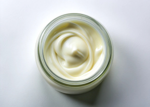 a jar of cream Top view