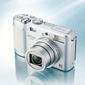 Brand new Nikon Coolpix L6 camera in pristine condition. Bright, clean background, showcasing the sleek design and clear lens.