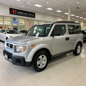 2006 Honda Element LX 2WD AT for sale at Horizon Auto Sales. Clean dealership showroom. Other vehicles visible in the background.