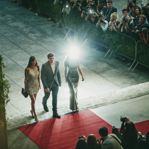 Clara Lago, Mario Casas, and Maria Valverde attend the Madrid premiere of a film. Red carpet, flashing cameras