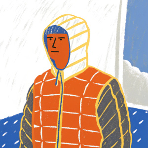 A man wearing the Mammut Rime Pro IS Hooded Insulated Jacket, featuring quilted blue and black panels with a zipper.