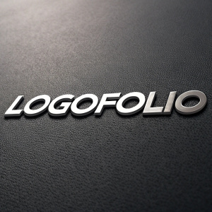 Close-up of 'LOGOFOLIO' in sleek, bold font. Dark background with subtle texture. Minimalist design.