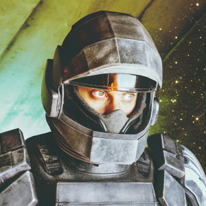 Alec Ryder, in full N7 armor, from Mass Effect Andromeda. Intense gaze, face close-up. Dark and moody space background.