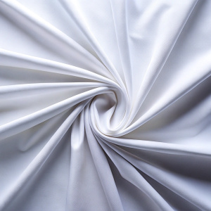 close up view white smooth fabric center fold background