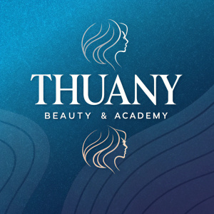 Modern logo design for Thuany Beauty & Academy. Brand name in sleek white sans-serif font over a gradient of royal to navy blue background.