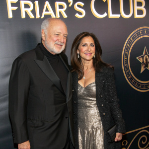 Rony Reiner and Michele Singer at the star-studded gala. Rob Reiner in black suit. The backdrop features 'Friar's Club' logo.