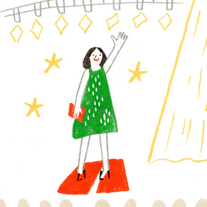 Yu Seung-Ok, a korean model, waving at a fashion gala. Brightly lit stage, logos of brands