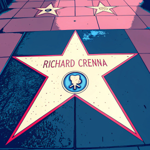 Golden star plaque on the Hollywood Walk of Fame. Richard Crenna's name in shiny gold letters. Bumpy pavement underfoot.