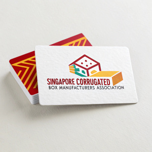 Promotional business cards for the Singapore Corrugated Box Manufacturers' Association. Vibrant logo design, bold text, minimalist white background.