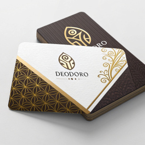 Deodoro's sleek business card. Dark brown base with gold accents. White background for text and logo.