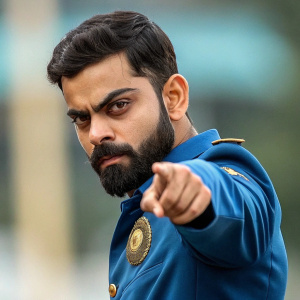 Virat Kohli, cricket star, in intense pose with a serious look, pointing at the camera. Blue uniform with golden insignia. Blurred background highlighting focus. Close-up shot, high-definition.