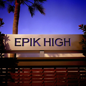 Modern logo for Epik High featuring minimalist design in dark, bold font against light, neutral backdrop. Promotional graphic for new album or shoebox release.