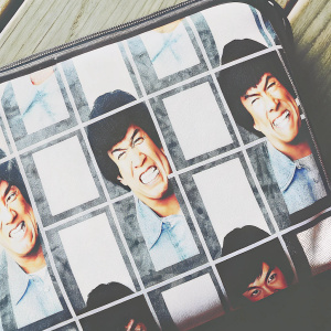 Multiple cartoon versions of Bruce Lee arranged in a mosaic. Each avatar set against a vibrant yellow backdrop. Close-up faces with detailed expressions.