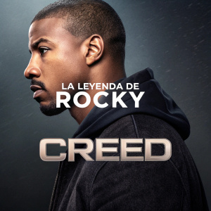 Promotional artwork for 'Creed'. Michael B. Jordan's headshot. Dark background with 'La Leyenda de Rocky' and 'Creed' text overlay