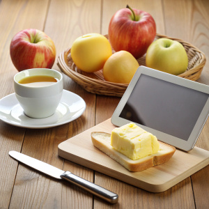 breakfast table with big chunk of magarine on  apple i pad